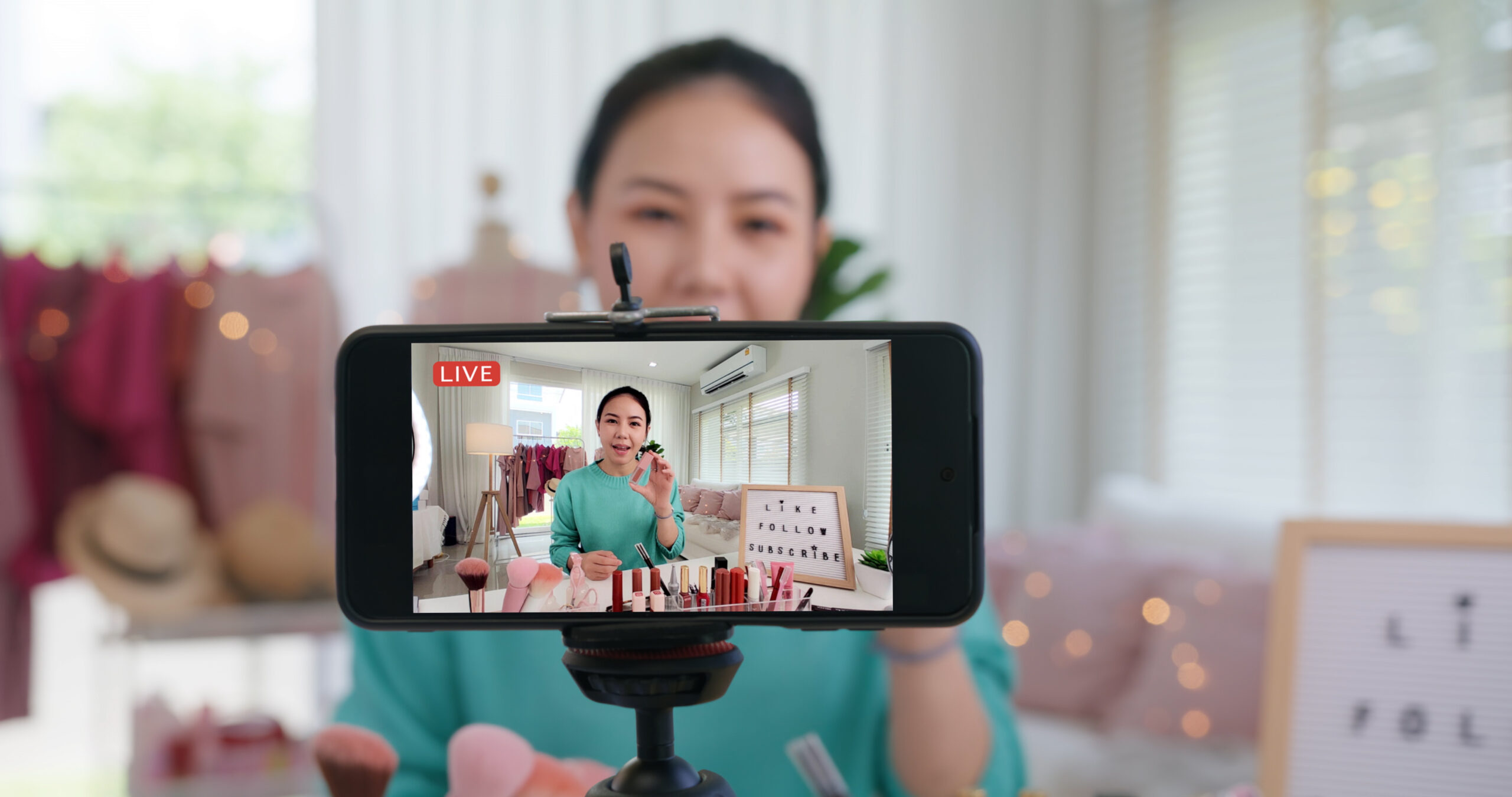 Women on live doing TikTok marketing