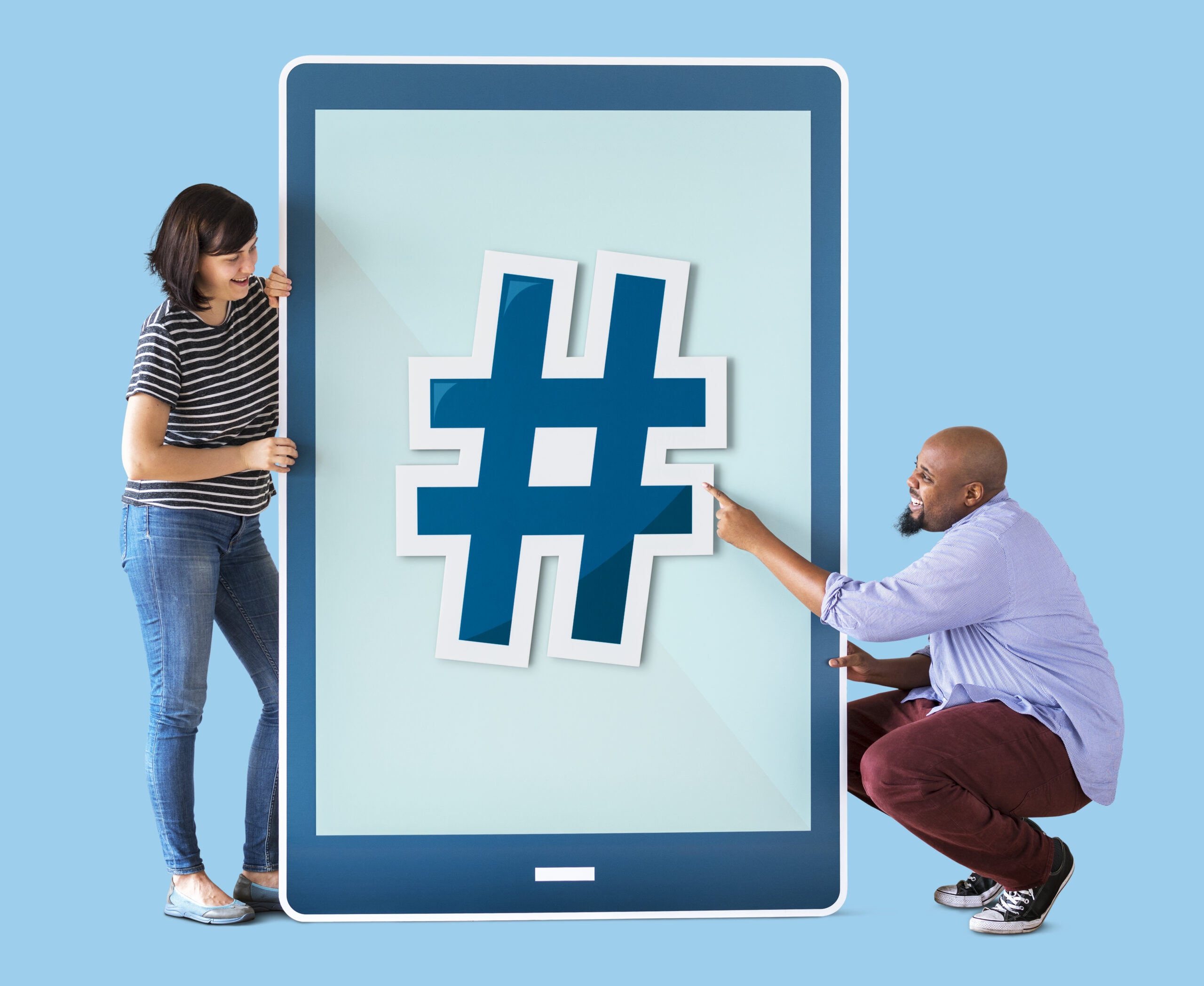 Two people pointing at hashtag