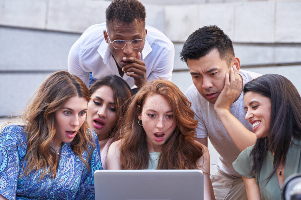 Group of people shocked at online reputation of a company