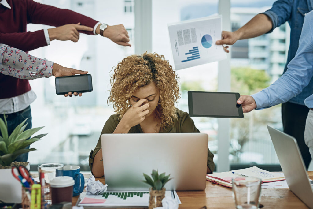 Image of employee experiencing burnout to highlight manager need to be managing employee burnout