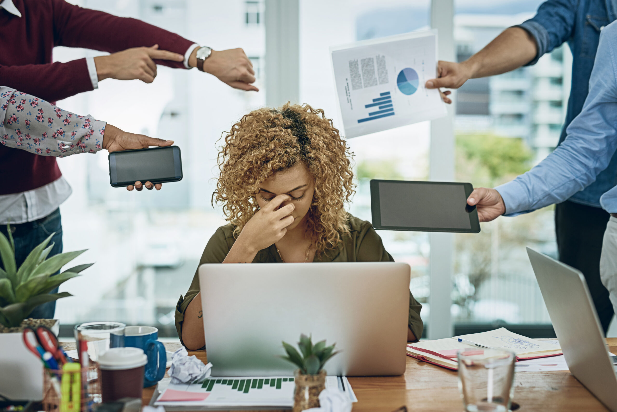 Image of employee experiencing burnout to highlight manager need to be managing employee burnout