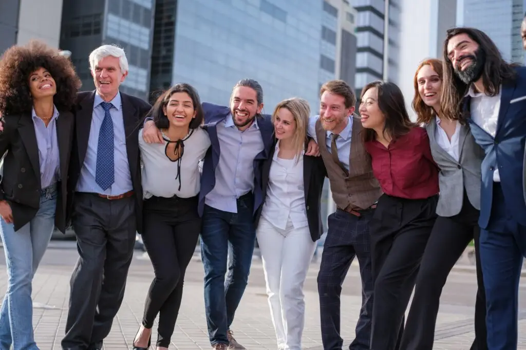 Management Training in the UK - Diverse group of work making team photo