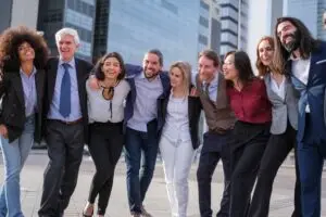 Management Training in the UK - Diverse group of work making team photo