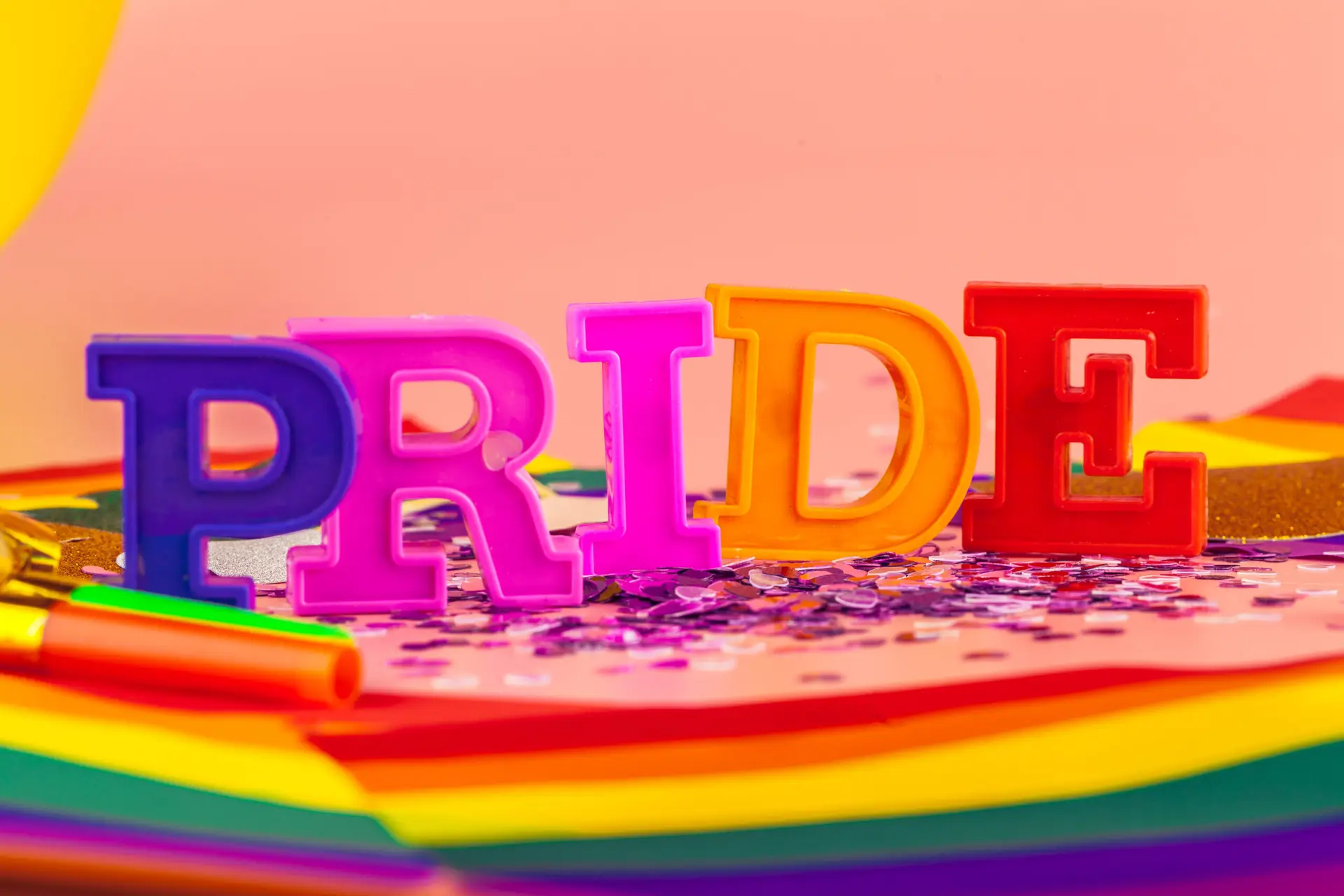 Image of letters spelling pride for pride month