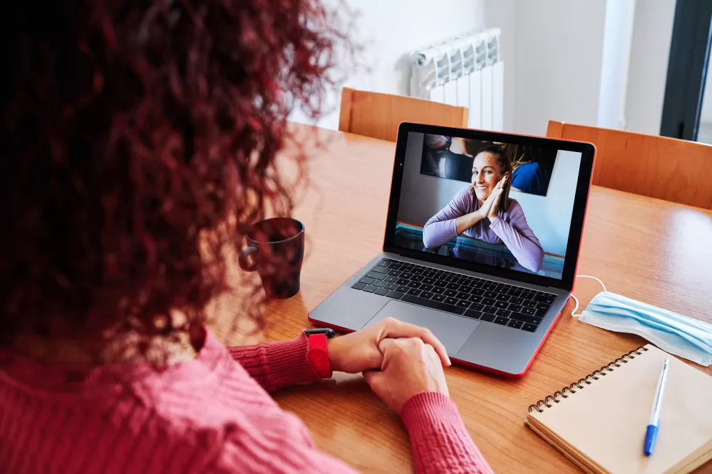 Two women connection with online recovery